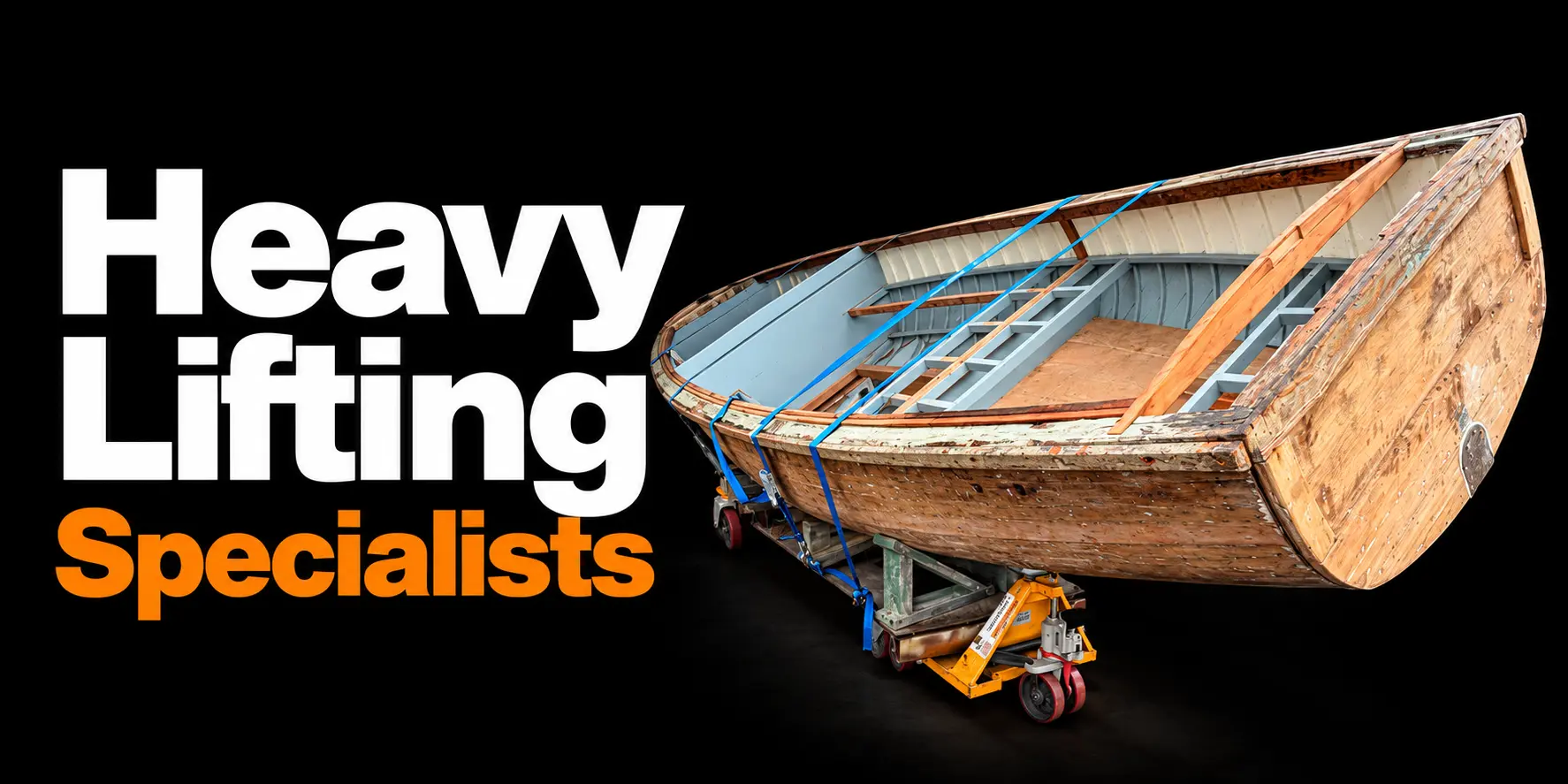 Heavy Lifting Specialists — JB’s secured boat on lifting equipment
