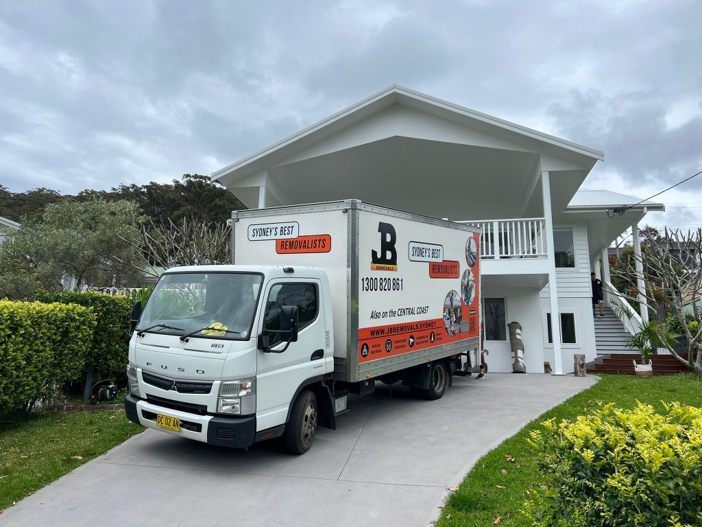 JB Removals truck parked in a Sydney driveway for a residential move