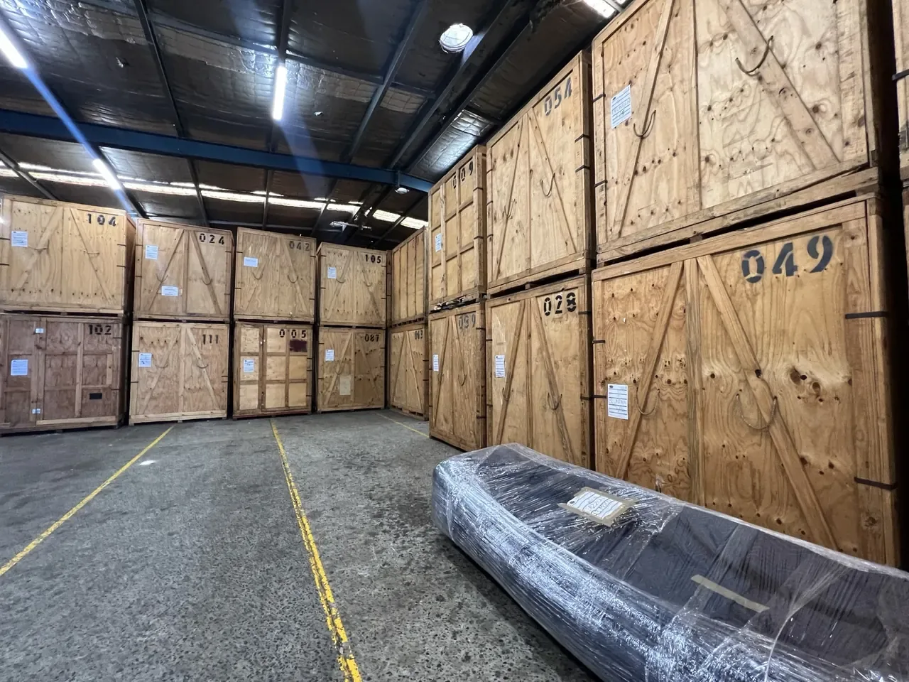 Numbered timber EasyBox storage MODs inside JB’s Sydney warehouse