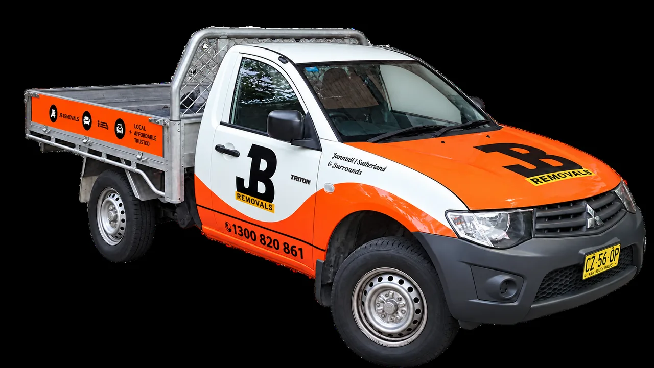 JB Removals ute with phone number 1300 820 861; allocated ute may differ