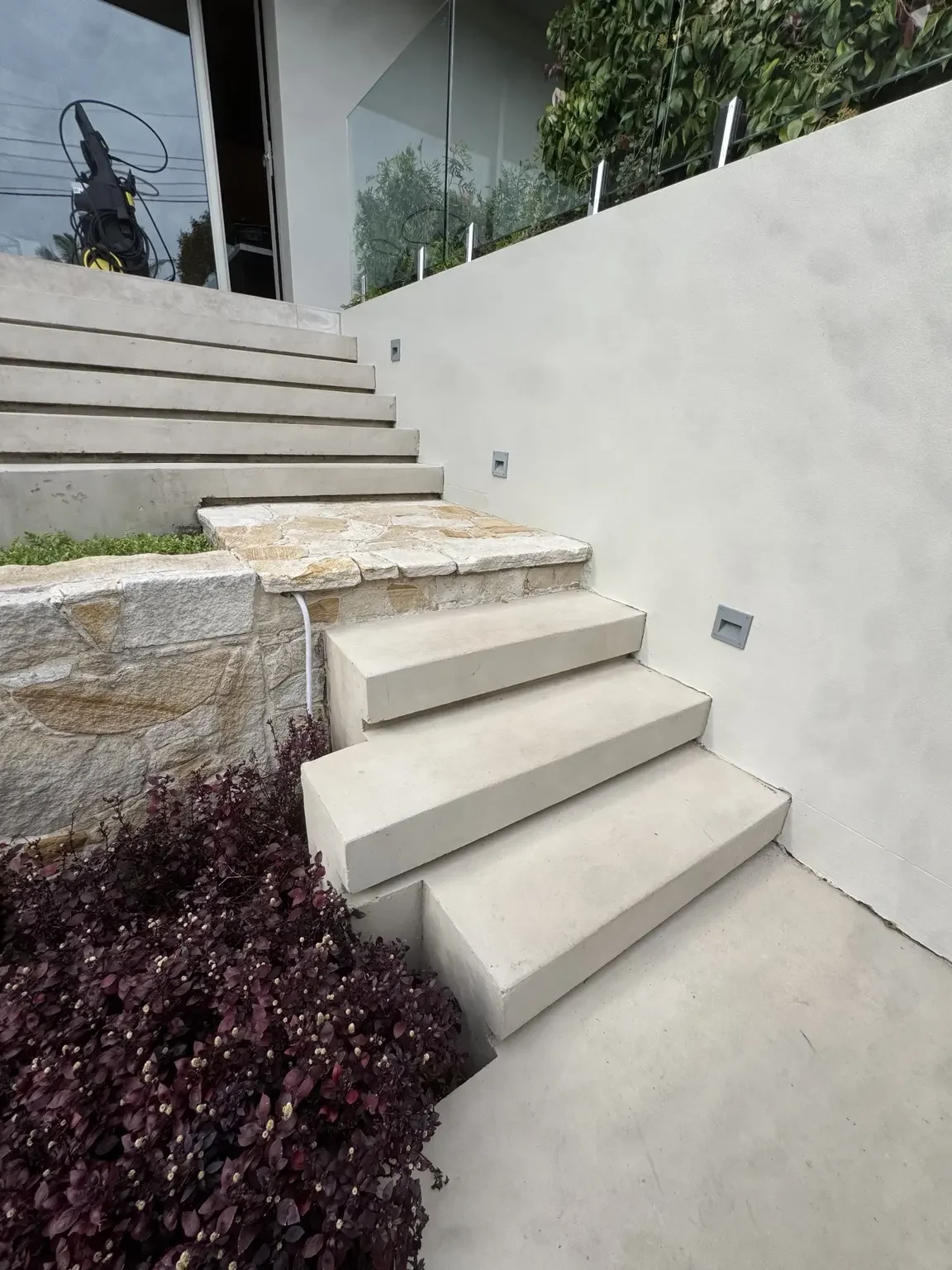 The outdoor staircase assessed before the ice bath move.