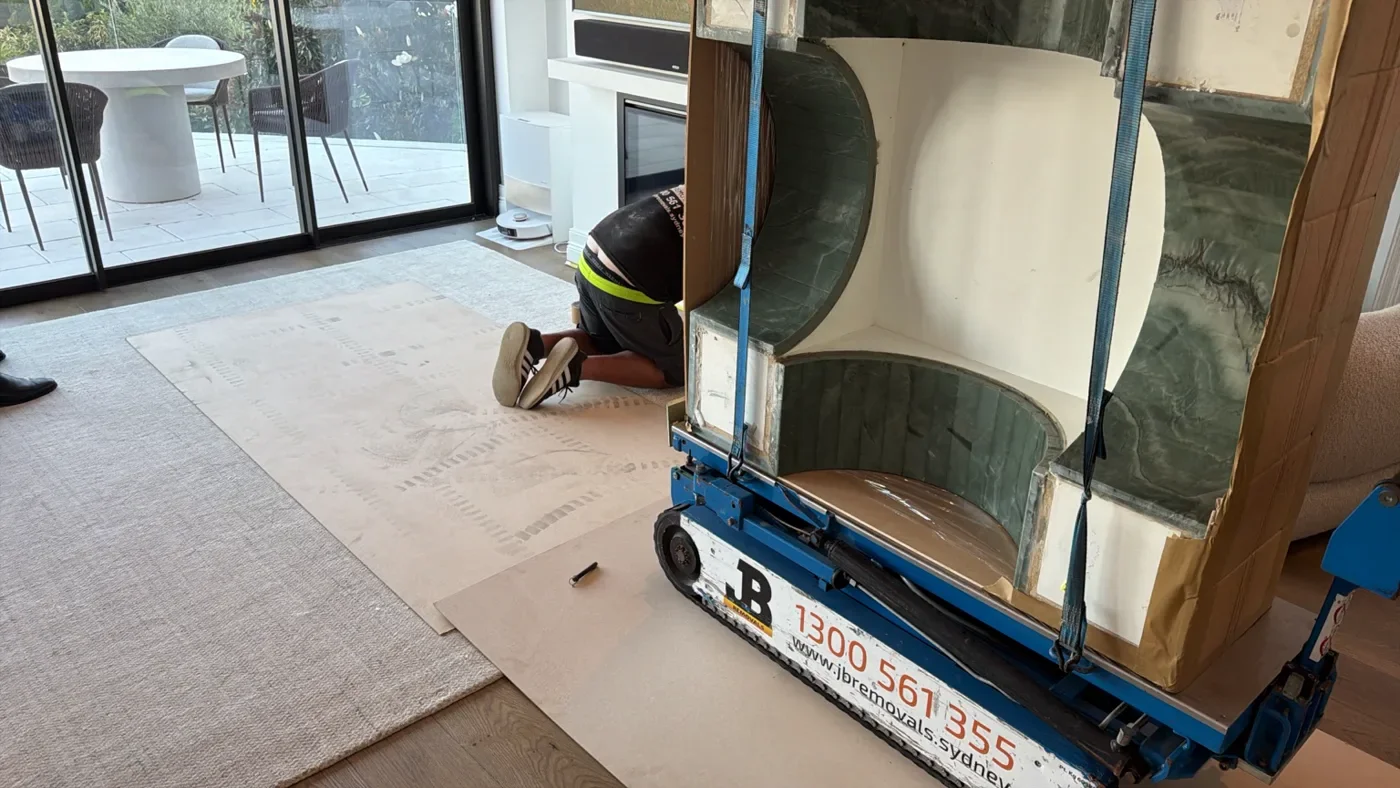 The secured marble table on moving equipment inside the property.