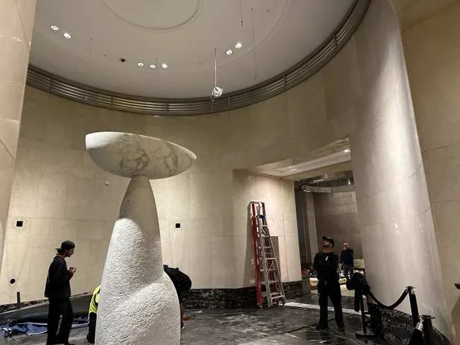 Two-piece marble sculpture standing in the Martin Place building lobby