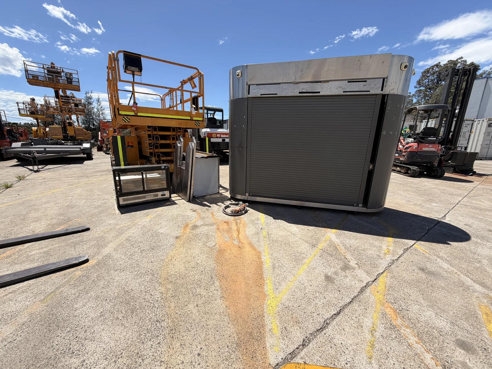 The coffee kiosk standing in the equipment yard after relocation.