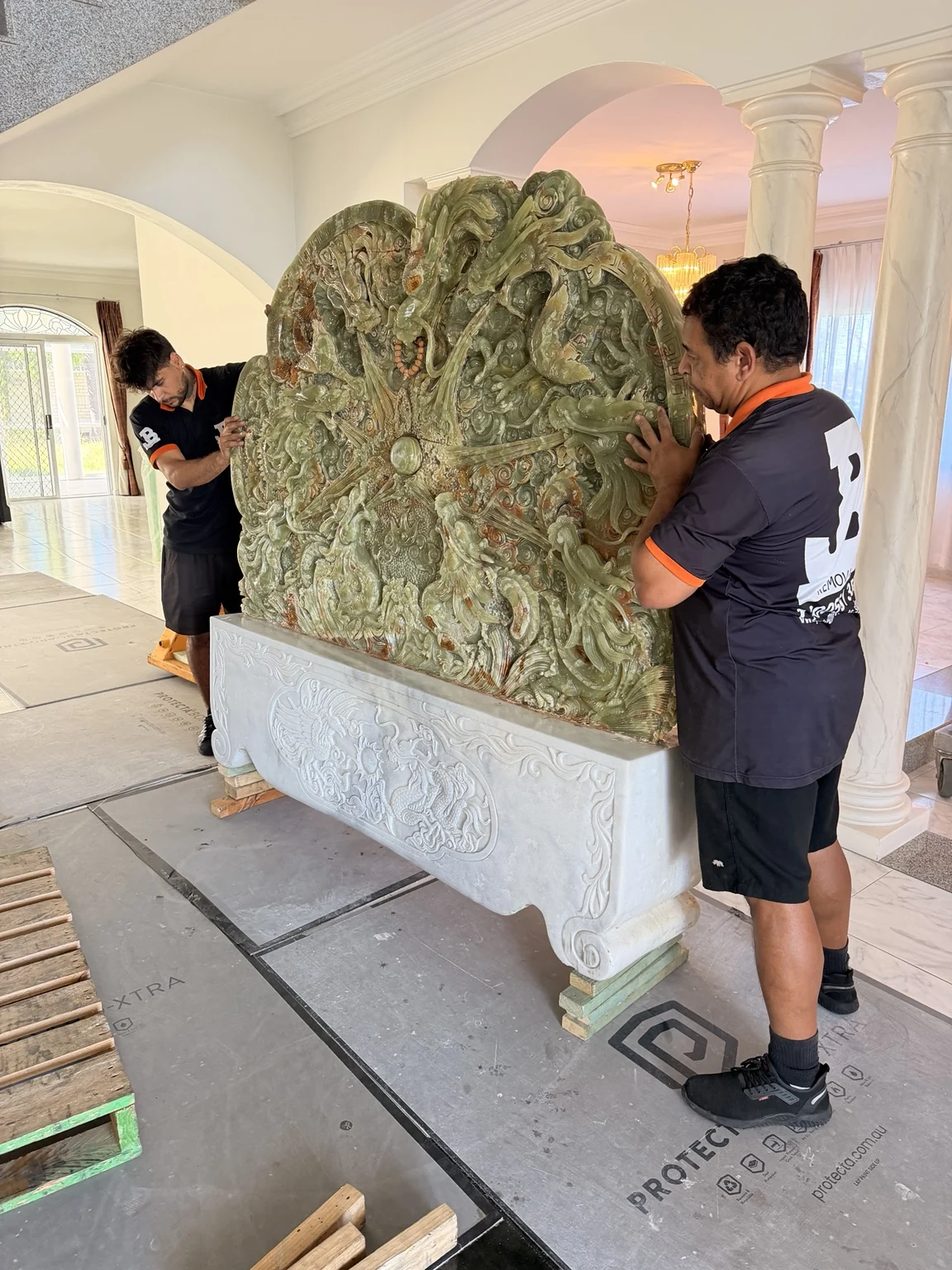 1.5-Tonne Stone Sculpture Relocation Over Steps
