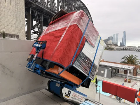 JB Removals: Protected 400kg gelato display fridge secured on the Hercules stair climber