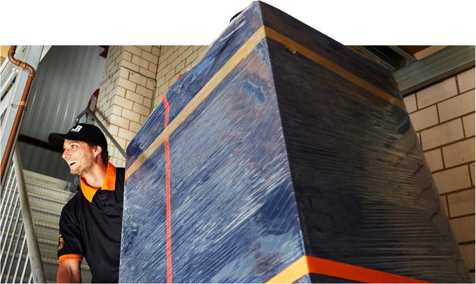 JB Removalist uniform team carrying big box